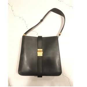Black leather purse with gold clasp